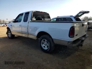2000 Ford F-150 XL with VIN 1FTRX17W3YNB62562, listed as a Copart auction lot 50375915 with Not provided miles and Salvage title. Bid and sale history available at DreamBid. Image 2.