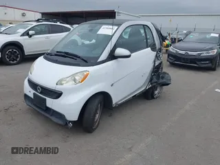 2013 Smart fortwo Pure with VIN WMEEJ3BA5DK625404, listed as a IAAI auction lot 42368884 with Not provided miles and . Bid and sale history available at DreamBid. Image 2.