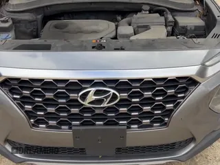 2019 Hyundai Santa Fe SEL с VIN 5NMS3CADXKH050958, выставлен на аукционе Copart как лот 90484835 с пробегом 153 434 миль миль и Чистый • Clean title. История ставок и продаж доступна на DreamBid. Изображение 11.