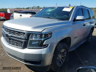 2015 Chevrolet Tahoe LT with VIN 1GNSCBKCXFR555438, listed as a IAAI auction lot 41624792 with 187,959 mi miles. Bid and sale history available at carsss.com. Image 2.