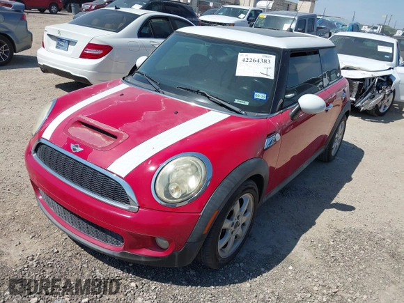 2009 MINI Hardtop S with VIN WMWMF73569TW86229, listed as a IAAI auction lot 42264383 with 63,482 mi miles and . Bid and sale history available at DreamBid. Image 2.
