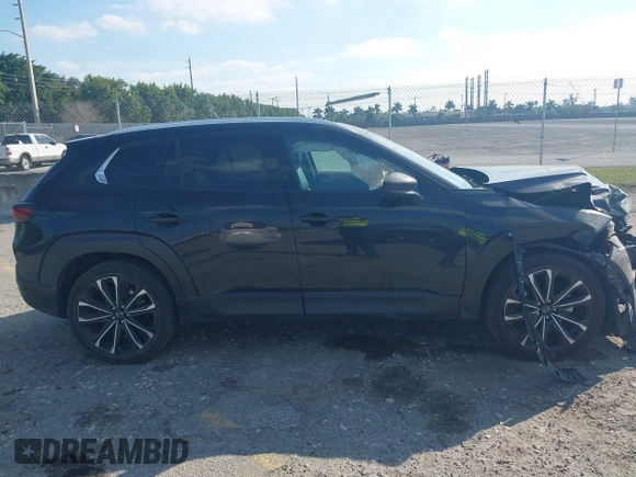 2023 Mazda CX-50 S Premium Plus with VIN 7MMVABEM1PN141344, listed as a IAAI auction lot 41473823 with 12,120 mi miles and . Bid and sale history available at DreamBid. Image 13.