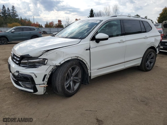 2020 Volkswagen Tiguan SEL Premium R-Line with VIN 3VV4B7AX8LM033024, listed as a Copart auction lot 77354494 with 127,247 mi miles and Salvage Title. Bid and sale history available at carsss.com. Image 1.
