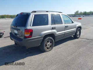 2002 Jeep Grand Cherokee with VIN 1J8GW48N72C207838, listed as a IAAI auction lot 42020294 with 181,283 mi miles and . Bid and sale history available at DreamBid. Image 4.
