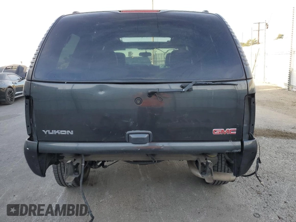 2005 GMC Yukon SLT z VIN 1GKEC13T35R120049, wystawiony jako Copart lot #42744495 z przebiegiem Nie podano mil oraz Szkoda całkowita • Salvage title. Historia ofert i sprzedaży dostępna na DreamBid. Obrazek 6.