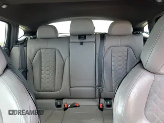 2020 BMW X4 M z VIN 5YMUJ0C08LLU67316, wystawiony jako Copart lot #53398995 z przebiegiem 34 470 mil mil oraz Szkody całkowita. Historia ofert i sprzedaży dostępna na DreamBid. Obrazek 10.