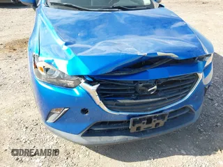2016 Mazda CX-3 Sport z VIN JM1DKFB73G0140286, wystawiony jako IAAI lot #42235327 z przebiegiem 83 430 mil mil oraz . Historia ofert i sprzedaży dostępna na DreamBid. Obrazek 6.