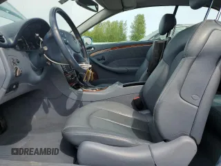 2004 Mercedes-Benz CLK 500 z VIN WDBTK75G44T020762, wystawiony jako Copart lot #56424375 z przebiegiem 63 994 mil mil oraz Szkody całkowita. Historia ofert i sprzedaży dostępna na DreamBid. Obrazek 7.