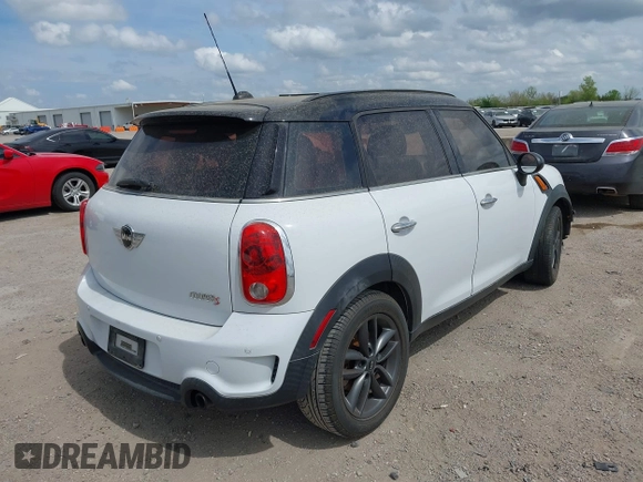 2012 MINI Countryman S with VIN WMWZC3C57CWL87877, listed as a IAAI auction lot 41909121 with Not provided miles and . Bid and sale history available at DreamBid. Image 4.