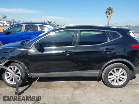 2019 Nissan Rogue Sport S with VIN JN1BJ1CPXKW233049, listed as a IAAI auction lot 42004455 with 63,427 mi miles. Bid and sale history available at carsss.com. Image 14.