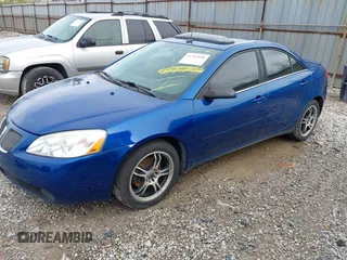 2005 Pontiac G6 GT with VIN 1G2ZH528754150157, listed as a IAAI auction lot 41946280 with 131,324 mi miles. Bid and sale history available at carsss.com. Image 2.