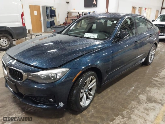 2014 BMW 3 Series Gran Turismo 328i xDrive with VIN WBA3X5C5XED557668, listed as a IAAI auction lot 41728522 with 123,393 mi miles. Bid and sale history available at carsss.com. Image 2.