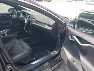 2017 Tesla Model S 100D with VIN 5YJSA1E47HF185734, listed as a IAAI auction lot 42076544 with 56,682 mi miles. Bid and sale history available at carsss.com. Image 5.