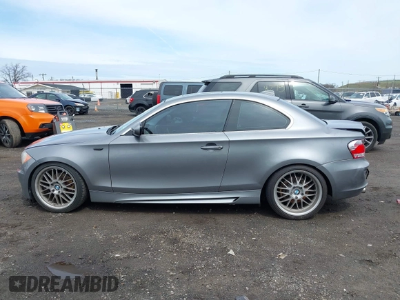 2011 BMW 1 Series 128i with VIN WBAUP9C52BVL89591, listed as a IAAI auction lot 41951870 with 131,377 mi miles and . Bid and sale history available at DreamBid. Image 14.