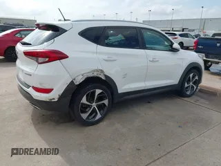 2016 Hyundai Tucson Limited with VIN KM8J33A21GU079870, listed as a IAAI auction lot 42074089 with 78,328 mi miles. Bid and sale history available at carsss.com. Image 4.