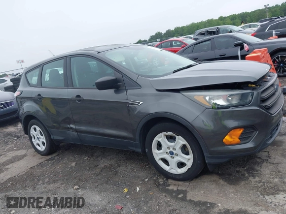2018 Ford Escape S with VIN 1FMCU0F79JUB96676, listed as a IAAI auction lot 42343829 with 115,123 mi miles and . Bid and sale history available at DreamBid. Image 13.