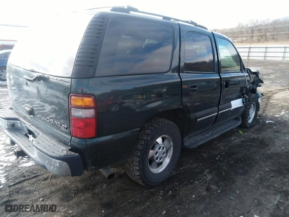 2003 Chevrolet Tahoe Special Service Veh with VIN 1GNEK13V33J215889, listed as a IAAI auction lot 41219639 with 157,570 mi miles. Bid and sale history available at carsss.com. Image 4.