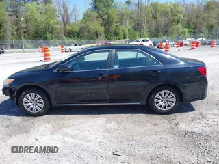 2014 Toyota Camry L with VIN 4T4BF1FK9ER408973, listed as a IAAI auction lot 42074491 with 183,934 mi miles and . Bid and sale history available at DreamBid. Image 14.