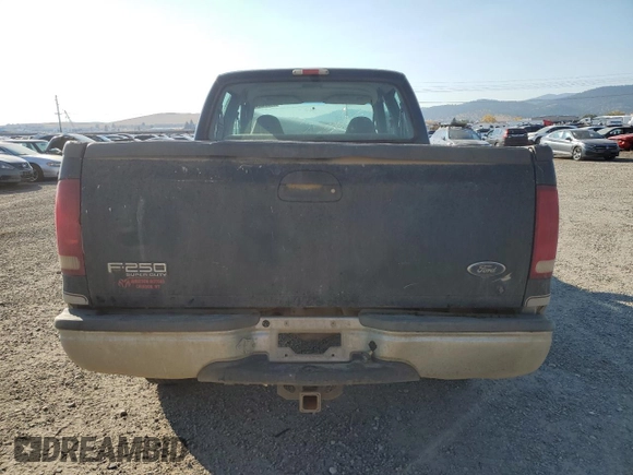 1999 Ford Super Duty F-250 XL with VIN 1FTNW21SXXEC58927, listed as a Copart auction lot 74631224 with 258,518 mi miles and Clean Title. Bid and sale history available at carsss.com. Image 6.