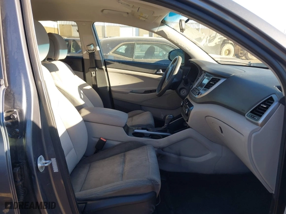 2016 Hyundai Tucson SE with VIN KM8J33A45GU089996, listed as a IAAI auction lot 41687069 with 129,957 mi miles. Bid and sale history available at carsss.com. Image 5.
