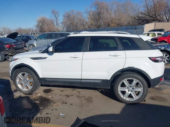 2014 Land Rover Range Rover Evoque Pure Plus z VIN SALVP2BG7EH866285, wystawiony jako IAAI lot #41412019 z przebiegiem 127 636 mil mil oraz . Historia ofert i sprzedaży dostępna na DreamBid. Obrazek 14.