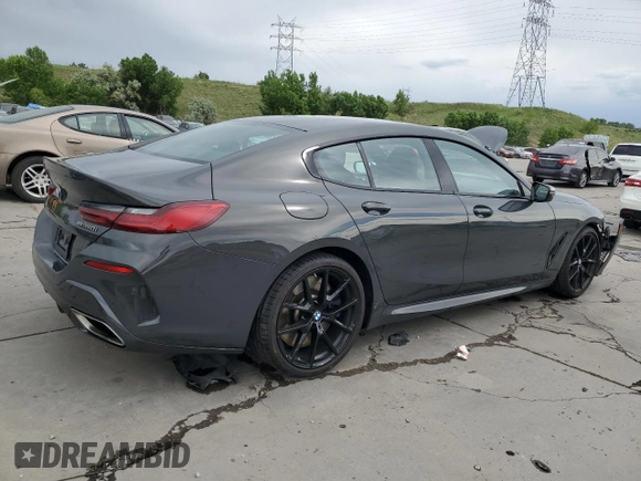 2020 BMW 8 Series M850i with VIN WBAGV8C0XLCD64228, listed as a Copart auction lot 60908315 with 67,643 mi miles and Salvage title. Bid and sale history available at DreamBid. Image 3.