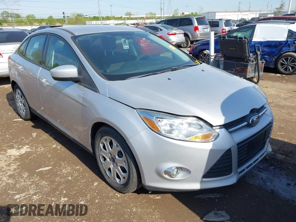 2012 Ford Focus SE with VIN 1FAHP3F20CL372391, listed as a IAAI auction lot 42100970 with 126,112 mi miles and . Bid and sale history available at DreamBid. Image 1.