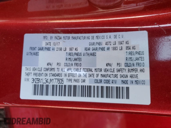 2018 Mazda 3 Touring with VIN 3MZBN1L34JM177605, listed as a Copart auction lot 52559395 with 56,267 mi miles and Clean Title. Bid and sale history available at DreamBid. Image 12.
