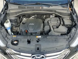 2014 Hyundai Santa Fe with VIN 5XYZUDLBXEG198796, listed as a Copart auction lot 56596375 with 106,017 mi miles and Salvage title. Bid and sale history available at DreamBid. Image 12.