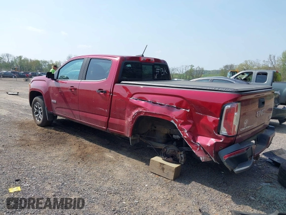 2019 GMC Canyon 4WD All Terrain z VIN 1GTG6FEN1K1290802, wystawiony jako IAAI lot #42150541 z przebiegiem 41 296 mil mil oraz . Historia ofert i sprzedaży dostępna na DreamBid. Obrazek 3.