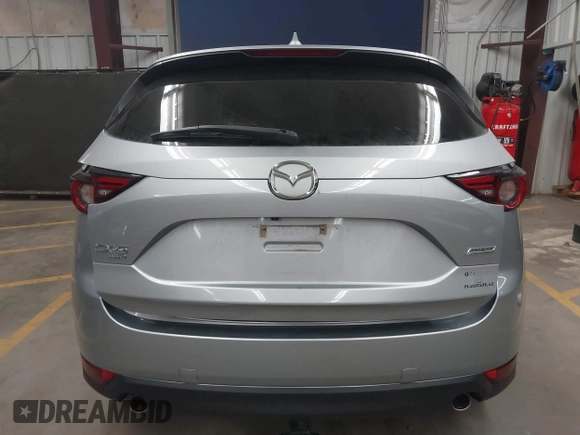 2018 Mazda CX-5 Grand Touring with VIN JM3KFBDM7J0316892, listed as a IAAI auction lot 41885705 with 90,386 mi miles. Bid and sale history available at carsss.com. Image 17.