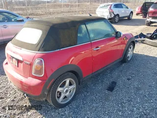 2010 MINI Convertible with VIN WMWMR3C59ATU97398, listed as a IAAI auction lot 41714054 with 12,663 mi miles and . Bid and sale history available at DreamBid. Image 4.