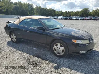 2002 Toyota Solara SE with VIN 2T1FF22P12C592550, listed as a Copart auction lot 74239934 with 221,988 mi miles and Salvage Title. Bid and sale history available at DreamBid. Image 4.
