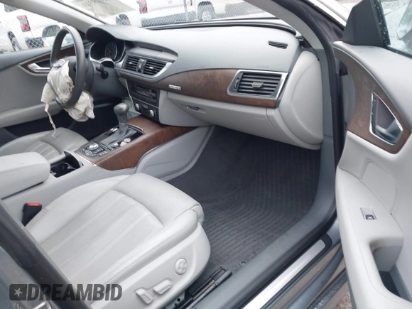 2012 Audi A7 Prestige with VIN WAU2GAFC9CN135476, listed as a IAAI auction lot 42009313 with 101,885 mi miles and . Bid and sale history available at DreamBid. Image 5.