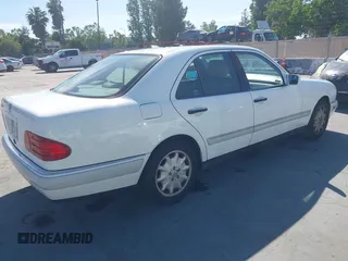 1996 Mercedes-Benz E 320 with VIN WDBJF55F1TJ014659, listed as a IAAI auction lot 42273213 with 151,584 mi miles and . Bid and sale history available at DreamBid. Image 4.