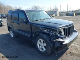 2011 Jeep Liberty Sport 70th Anniversary with VIN 1J4PN2GKXBW539030, listed as a IAAI auction lot 41913633 with 115,605 mi miles. Bid and sale history available at carsss.com. Image 1.