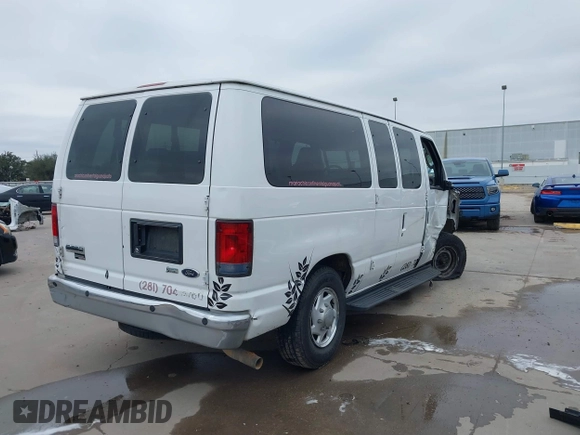 2011 Ford Econoline Passenger XL with VIN 1FBNE3BL2BDB02920, listed as a IAAI auction lot 41621713 with 270,140 mi miles. Bid and sale history available at carsss.com. Image 4.