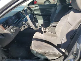 2016 Chevrolet Impala Limited LT with VIN 2G1WB5E33G1148705, listed as a Copart auction lot 43376935 with 161,587 mi miles and Salvage Title. Bid and sale history available at carsss.com. Image 7.