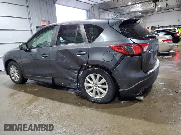2014 Mazda CX-5 Touring with VIN JM3KE4CY6E0421738, listed as a Copart auction lot 45888885 with 103,693 mi miles and Salvage Title. Bid and sale history available at carsss.com. Image 2.