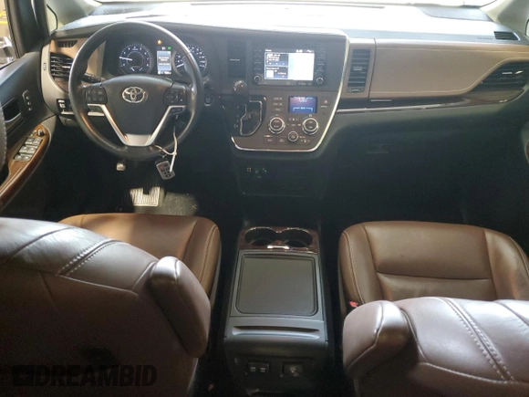 2018 Toyota Sienna XLE with VIN 5TDDZ3DC9JS204307, listed as a Copart auction lot 57327715 with 70,886 mi miles and Salvage title. Bid and sale history available at DreamBid. Image 8.