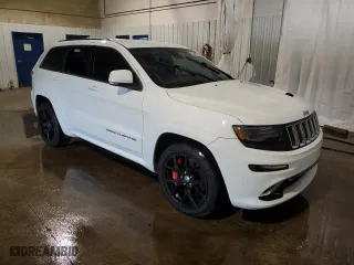 2015 Jeep Grand Cherokee SRT with VIN 1C4RJFDJ9FC237930, listed as a Copart auction lot 63540384 with 126,606 mi miles and Salvage Title. Bid and sale history available at carsss.com. Image 4.