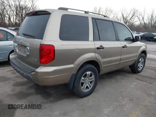 2005 Honda Pilot EX-L with VIN 5FNYF18505B040059, listed as a IAAI auction lot 41656782 with 234,723 mi miles. Bid and sale history available at carsss.com. Image 4.