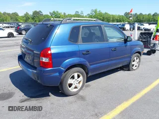 2005 Hyundai Tucson GL with VIN KM8JM12B85U233228, listed as a IAAI auction lot 42051627 with 170,742 mi miles. Bid and sale history available at carsss.com. Image 4.