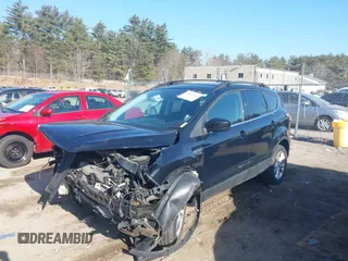 2017 Ford Escape SE with VIN 1FMCU9GD5HUC70341, listed as a IAAI auction lot 41801365 with 135,439 mi miles. Bid and sale history available at carsss.com. Image 2.