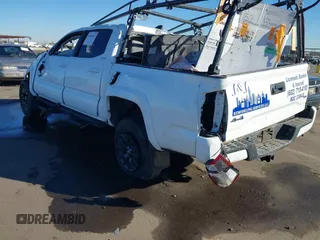 2022 Toyota Tacoma SR with VIN 3TMCZ5AN3NM456220, listed as a IAAI auction lot 41286882 with Not provided miles and . Bid and sale history available at DreamBid. Image 3.