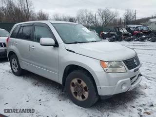2012 Suzuki Grand Vitara Premium with VIN JS3TD0D25C4101756, listed as a IAAI auction lot 41527328 with 136,773 mi miles. Bid and sale history available at carsss.com. Image 1.