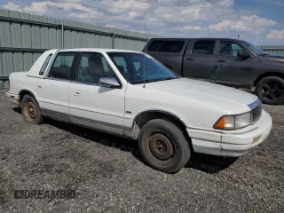 1992 Chrysler LeBaron z VIN 3C3XA5633NT336573, wystawiony jako Copart lot #54551495 z przebiegiem Nie podano mil oraz Tytuł czysty. Historia ofert i sprzedaży dostępna na DreamBid. Obrazek 4.