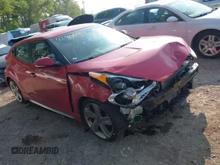 2013 Hyundai Veloster Turbo with VIN KMHTC6AEXDU138141, listed as a IAAI auction lot 42401259 with 150,974 mi miles and . Bid and sale history available at DreamBid. Image 1.