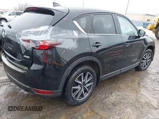 2018 Mazda CX-5 Touring with VIN JM3KFBCMXJ0450040, listed as a IAAI auction lot 41650824 with 83,133 mi miles. Bid and sale history available at carsss.com. Image 4.