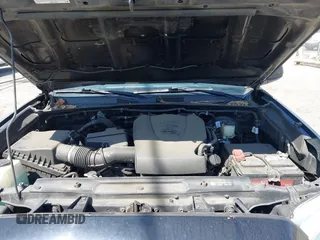 2018 Toyota Tacoma SR5 with VIN 3TMAZ5CN1JM061127, listed as a IAAI auction lot 42012247 with 119,381 mi miles and . Bid and sale history available at DreamBid. Image 10.